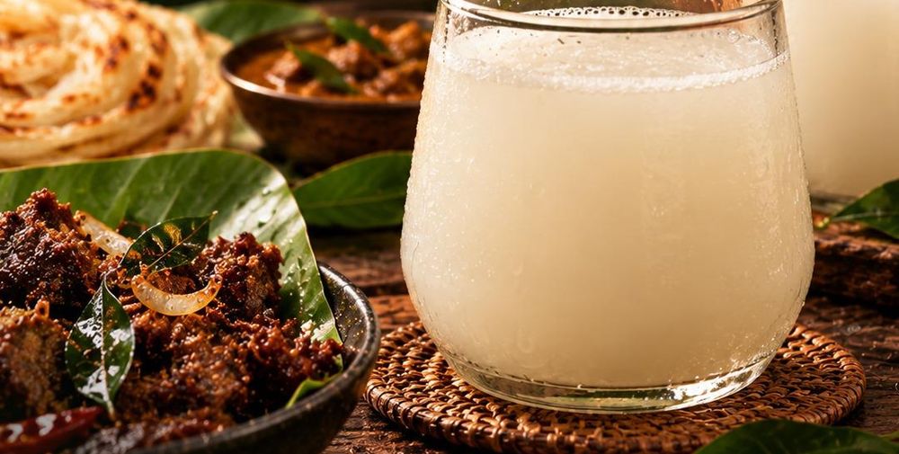 Fresh Kerala toddy with beef fry and porotta